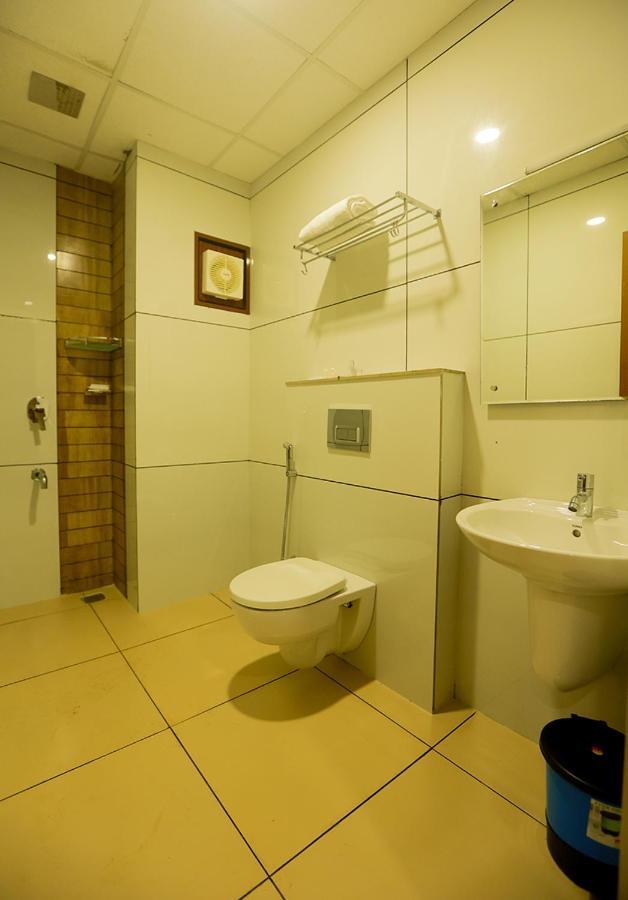Hotel Emirates Kannangad ภายนอก รูปภาพ